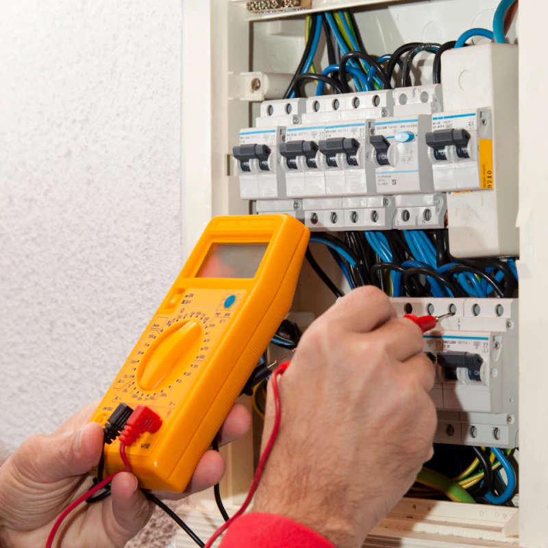 electrician checking the panel voltage